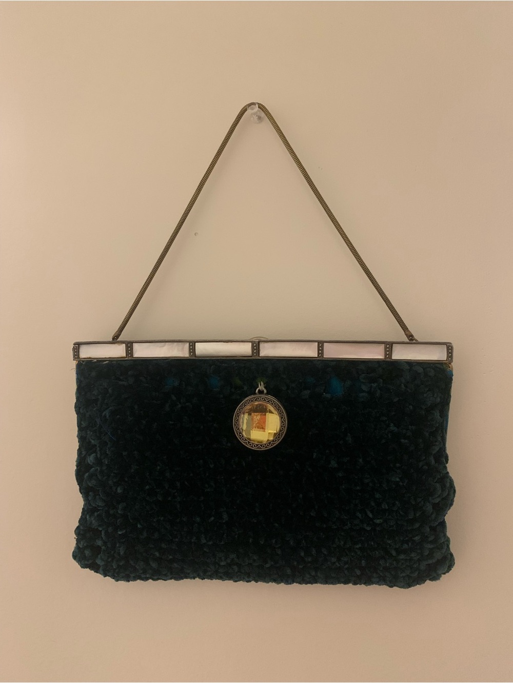 Green velvet clutch with mother of pearl clasp and silk lining